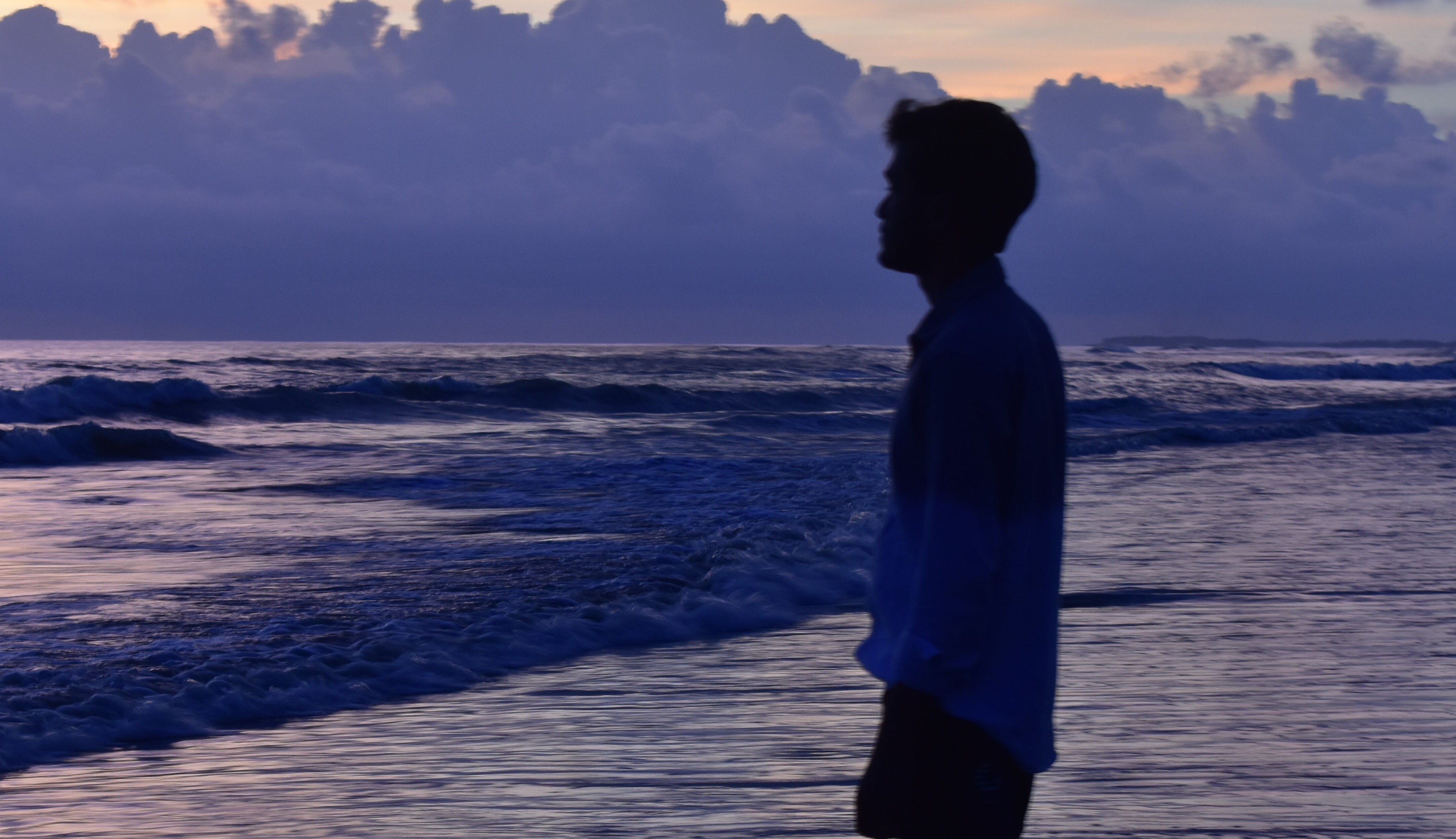 Standing on the Sea Beach: A Moment of Serenity